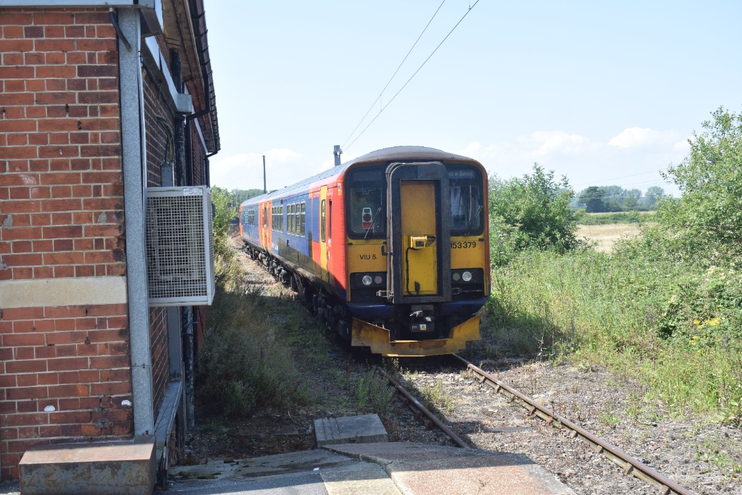 Hardley Distant on Train Siding: CURRENT: 153379 (Nearest Camera - 1st Photo) and 153384 (Nearest Camera - 2nd Photo) stand in the siding adjacent to
Manningtree...