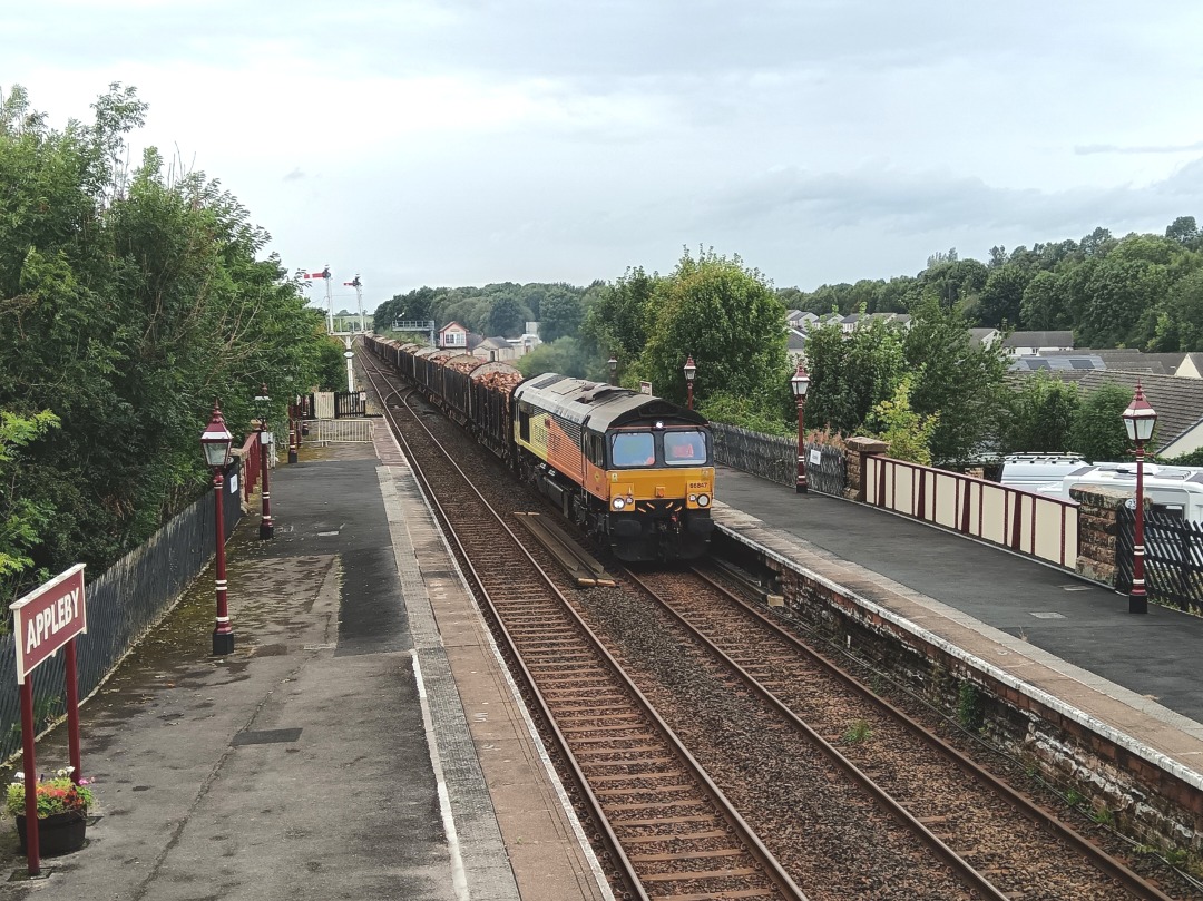 Whistlestopper on Train Siding: Colas Rail class 66/8 No. #66847 passing Appleby this afternoon working 6J37 1252 Carlisle Yard to Chirk Kronospan.