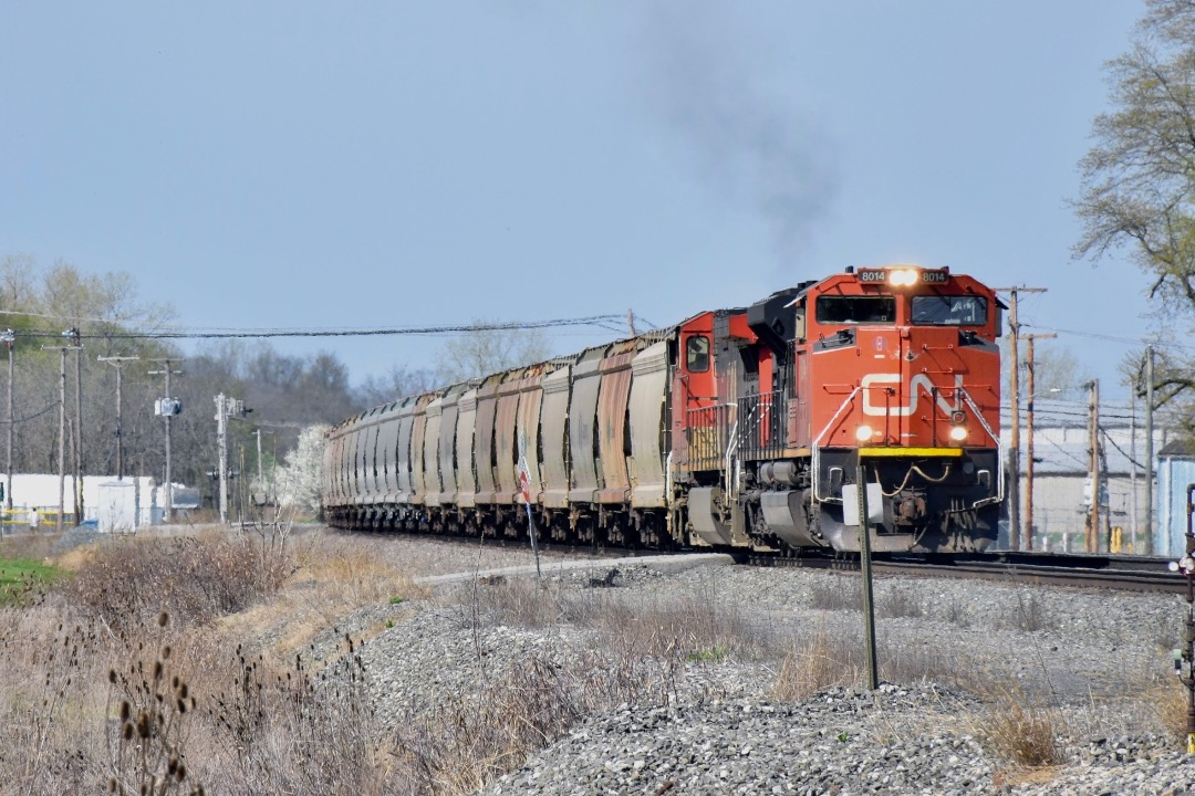 Railfan Ashton Productions on Train Siding: CN SD70M-2 with a high headlight leads Norfolk Southern 62U EB in Butler Indiana