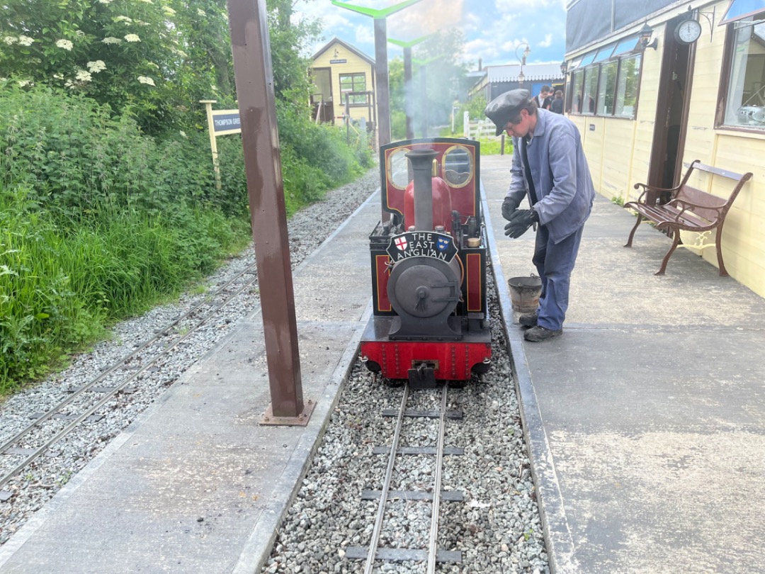 John Court on Train Siding: Mini rail at East Anglian Railway museum with it headboard which says The East Anglian, the locomotive name is Fredrick as he wait
the next...