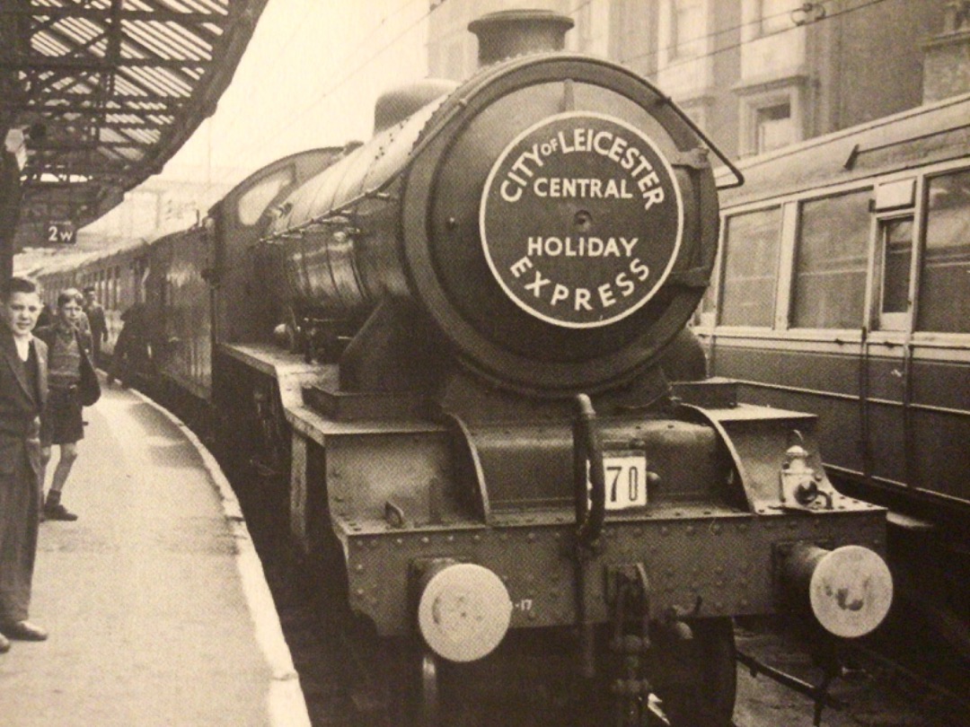 Alex Coomber on Train Siding: Watched by a couple of young trainspotters. An ex LNER Class B17 4-6-0 stands at Sheffield Victoria with a City of Leicester
Holiday...