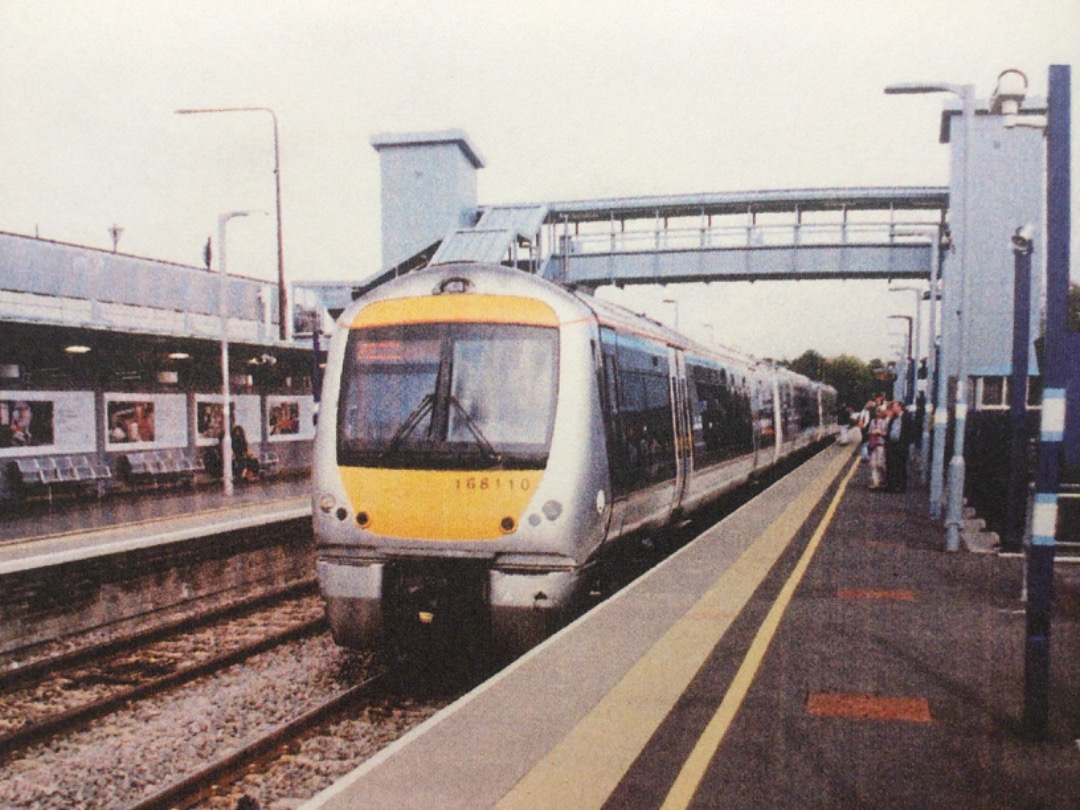 Alex Coomber on Train Siding: A Class 168. No. 168110 arrives at Bicester Village from London Marylebone on 7th September 2017. The entrance to the shopping
village is...