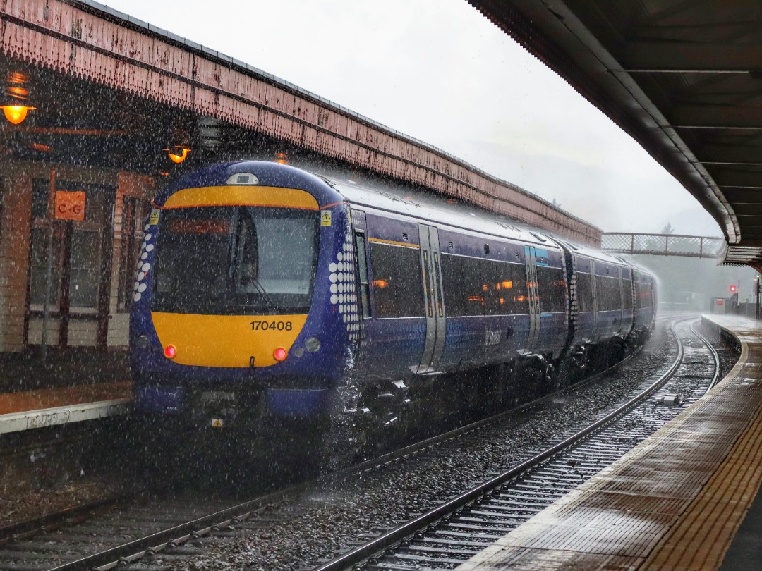 The Jamster on Train Siding: Scotrail 170408 departs Aviemore on the rear of 1T92 1726 Inverness to Glasgow Queen Street during a torrential downpour and
thunderstorm...