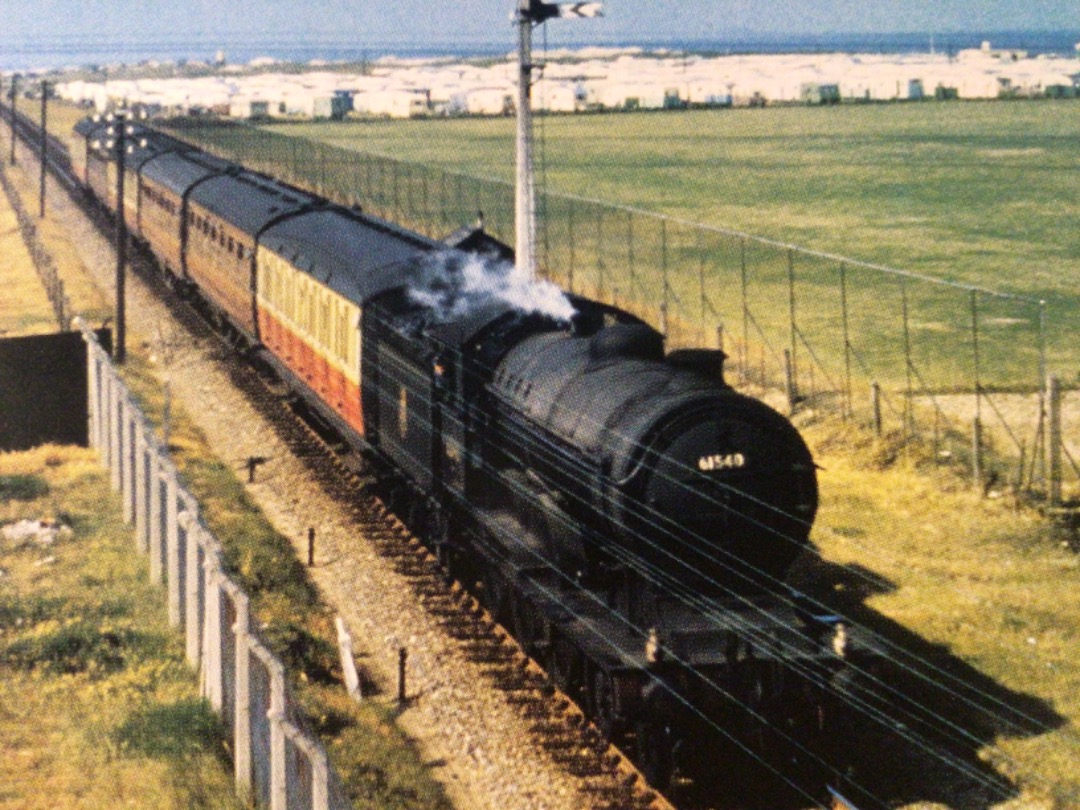 Alex Coomber on Train Siding: With a sea of caravans in the distance. An ex GER Class B12/3 No. 61540 approaches Yarmouth. South of Caister On Sea with a train
from...