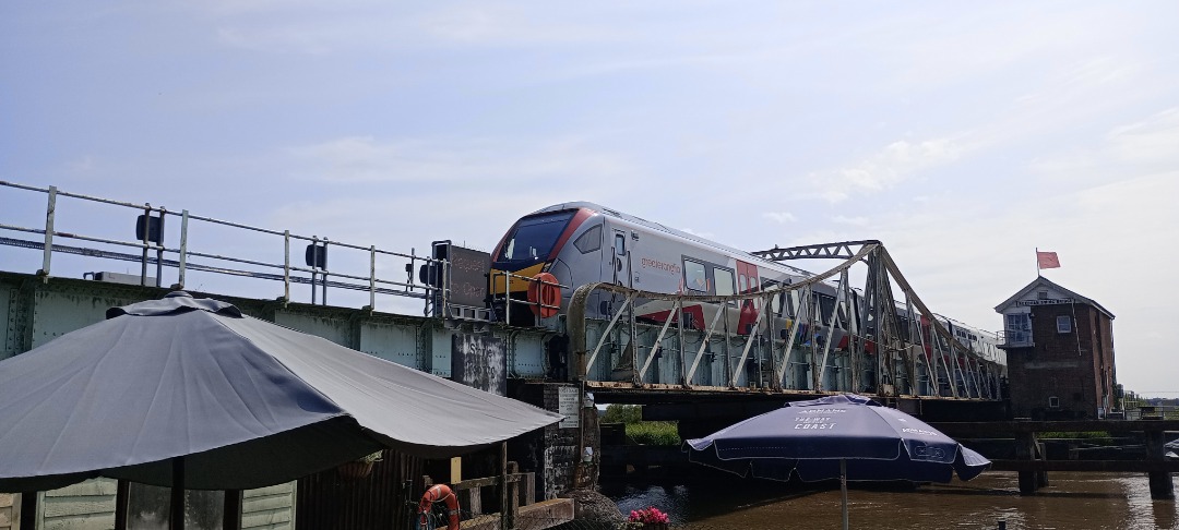 Hardley Distant on Train Siding: CURRENT: 755421 crosses Reedham Swing Bridge on Wednesday 24th July 2024 with the 2J79 13:48 Lowestoft to Norwich (Greater
Anglia)...