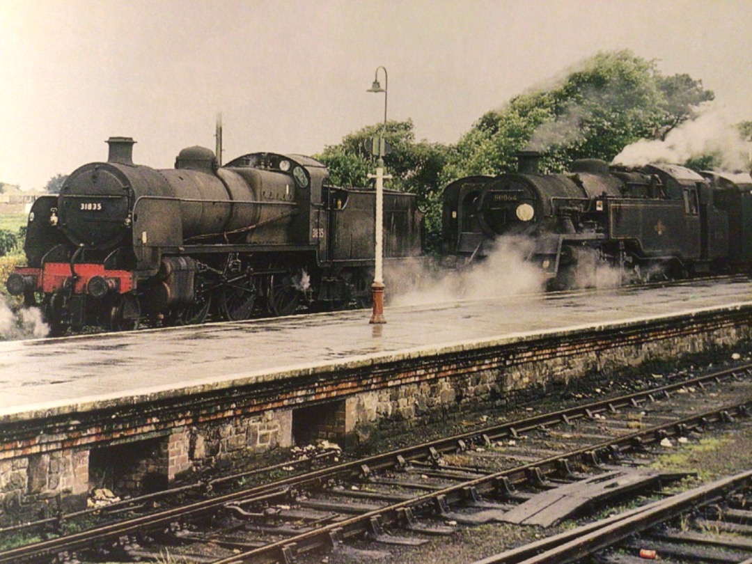 Alex Coomber on Train Siding: A steam scene at Bude Terminus in 1964 with an N Class 2-6-0. No. 31835 waiting in the siding and a BR Standard Class 4 2-6-4T No.
80064...