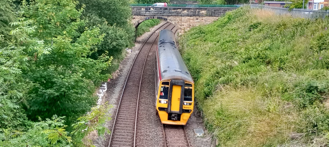 Hardley Distant on Train Siding: CURRENT: 158827 passes Rhosymedre near Ruabon today with the 1J70 17:28 Holyhead to Shrewsbury (Transport for Wales) service.