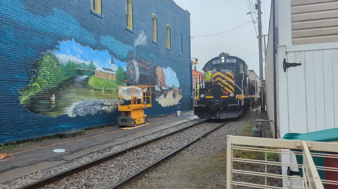 CaptnRetro on Train Siding: "Hometown Homage" - This mornings departure of Arcade & Attica No. 114 past a new/in progress mural across the street
from the depot....