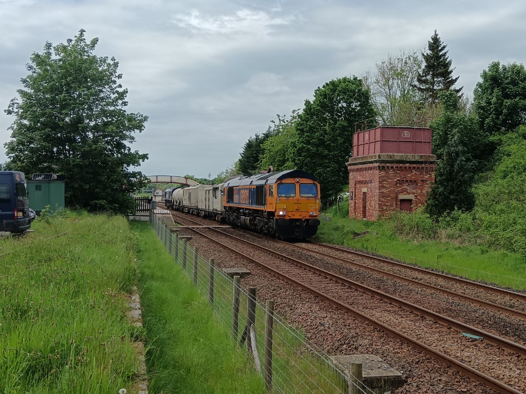 Whistlestopper on Train Siding: GB Railfreight class 66/7s No. #66761 "Wensleydale Railway Association 25 Years 1990-2015" and #66727 "Maritime
One" passing Appleby...