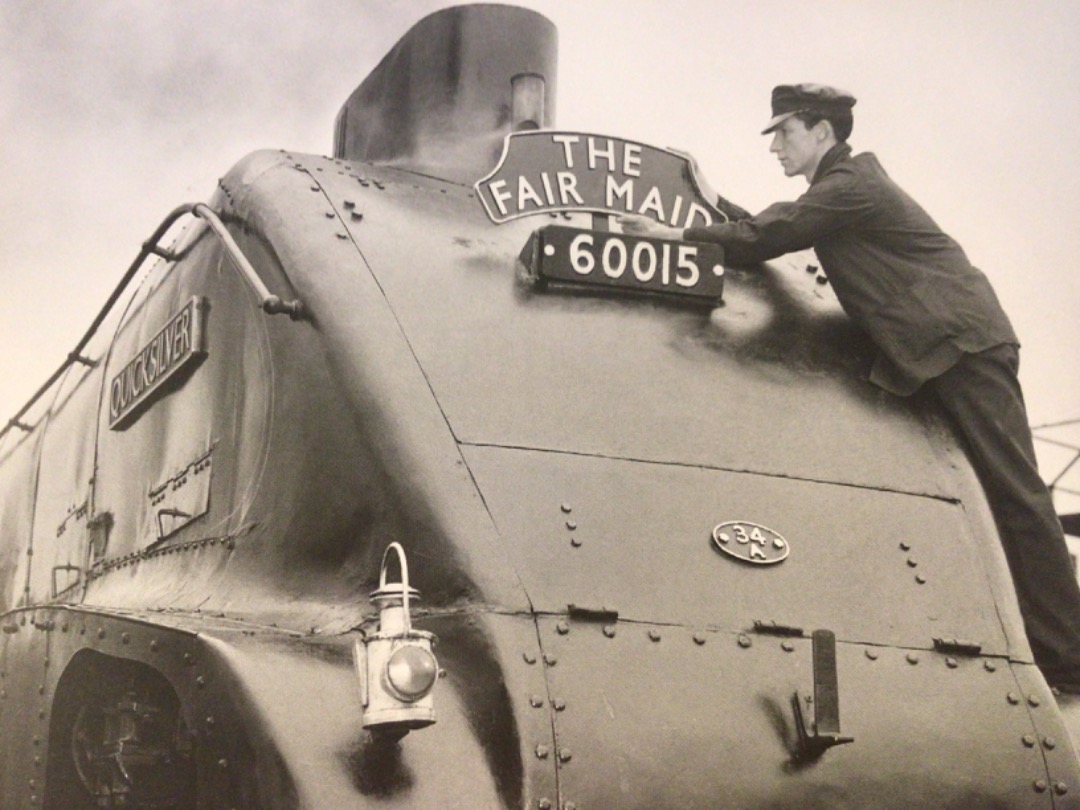 Alex Coomber on Train Siding: A driver attaching the headboard to the Class A4 4-6-2 No. 60015 Quicksilver in readiness for the inaugural run of The Fair Maid
at Kings...