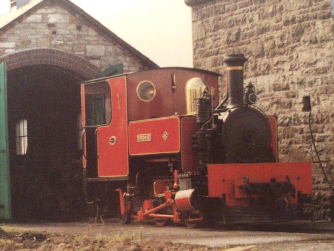 Alex Coomber on Train Siding: Standing beside the attractive stone engine shed and water tower is the Cavin & Leitrim Railways Kerr Stuart 0-4-2 saddle tank
of 1916.