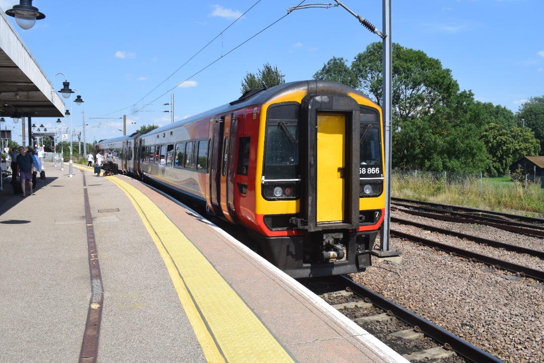 Hardley Distant on Train Siding: CURRENT: 158866 stands at Ely Station today with the 1R74 12:56 Norwich to Liverpool Lime Street (East Midlands Trains)
service.