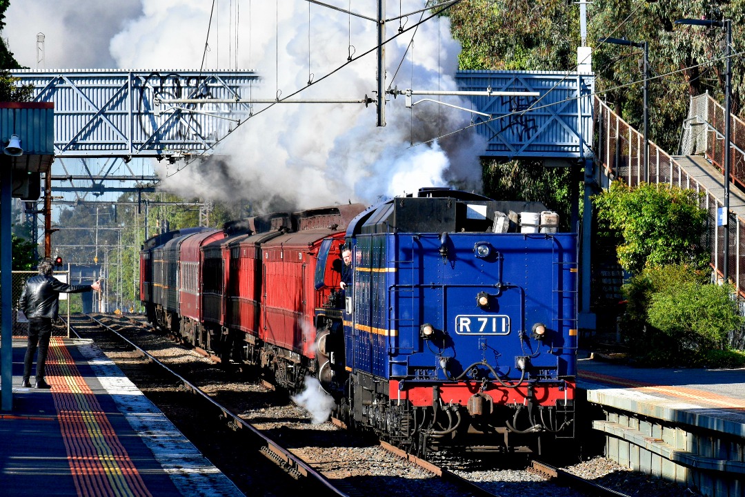 Shawn Stutsel on Train Siding: Running tender first, Steamrail's R711 races through Seddon Station, Melbourne with a Passenger Car transfer to Southern
Cross Station...