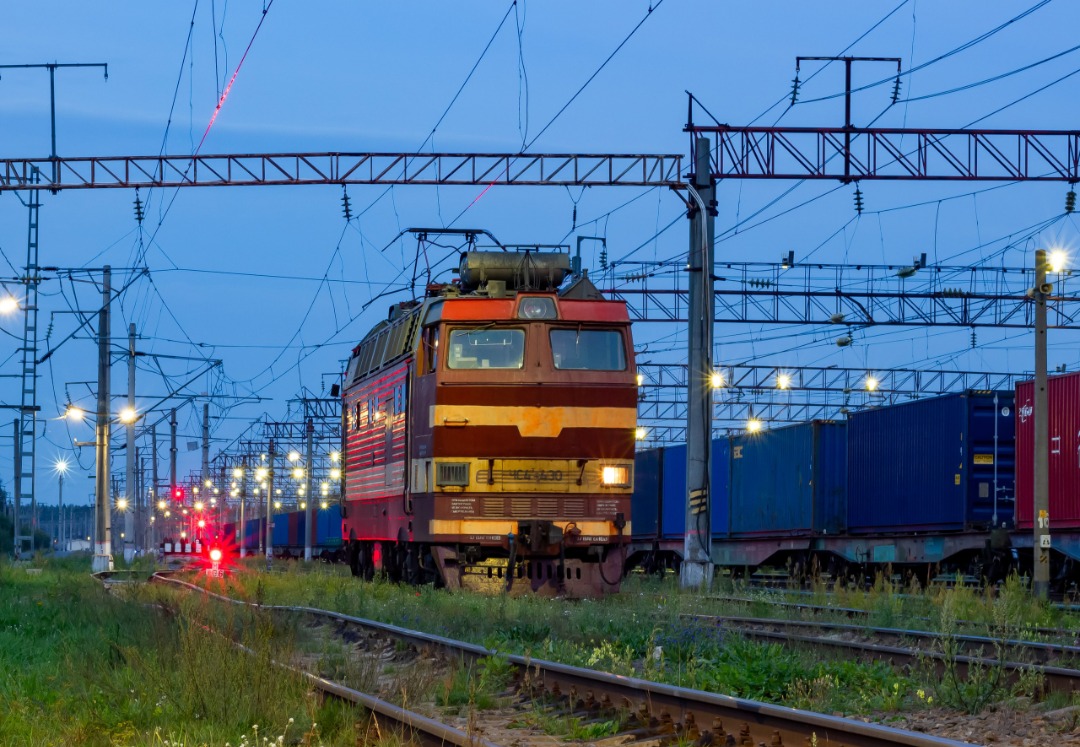 CHS200-011 on Train Siding: The electric locomotive ChS4T-430 enters the layover track at night, uncoupled from the station... Vologda region, docking station
(AC to...