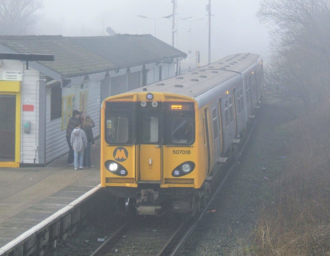 The Jamster on Train Siding: Merseyrail 507018 pauses at Bidston on a cold February morning while working a West Kirby to Liverpool Central train. 03/02/07