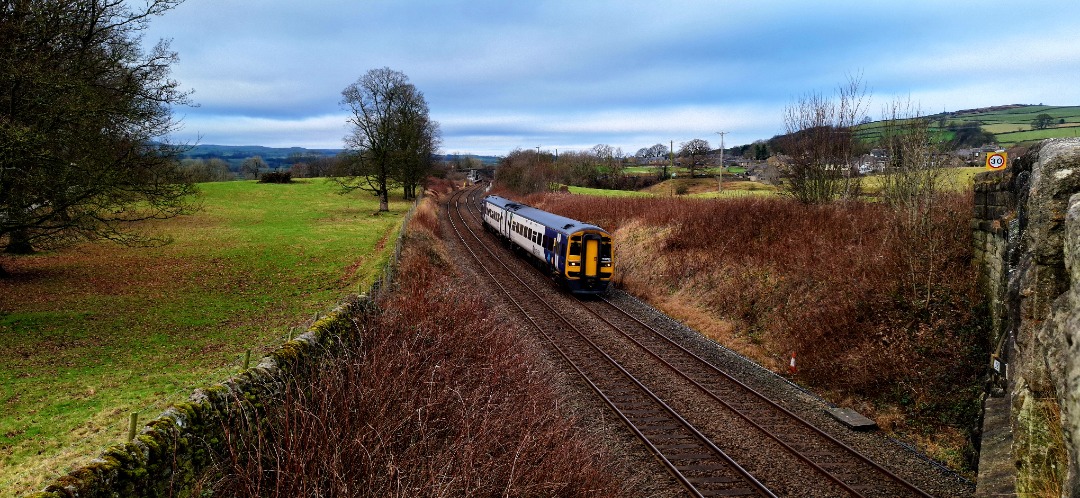 Guard_Amos on Train Siding: 158904 passes through the quiet North Yorkshire Village of Long Preston whilst working 2H89 1058 from Carlisle to Leeds on 12th
December 2024