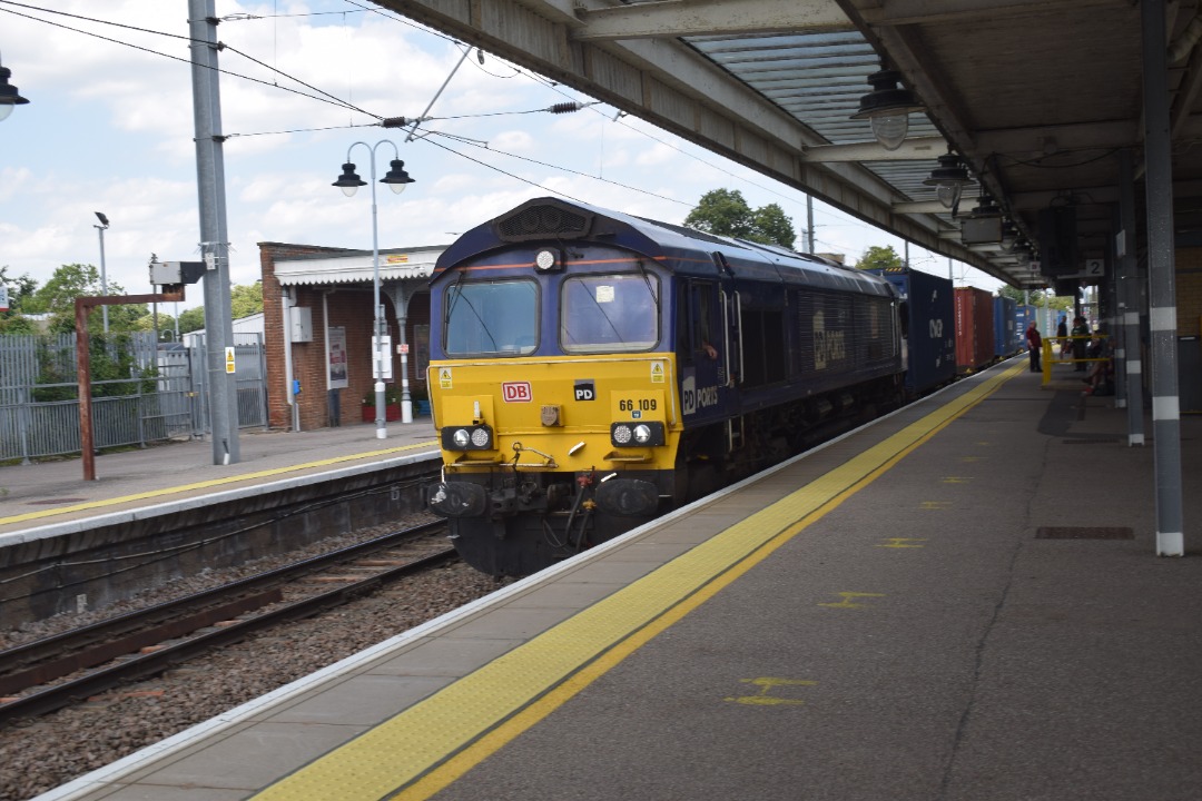 Hardley Distant on Train Siding: CURRENT: 66109 'Teesport Express' passes through Ely Station today with the 4L45 10:02 Wakefield Europort to
Felixstowe North...