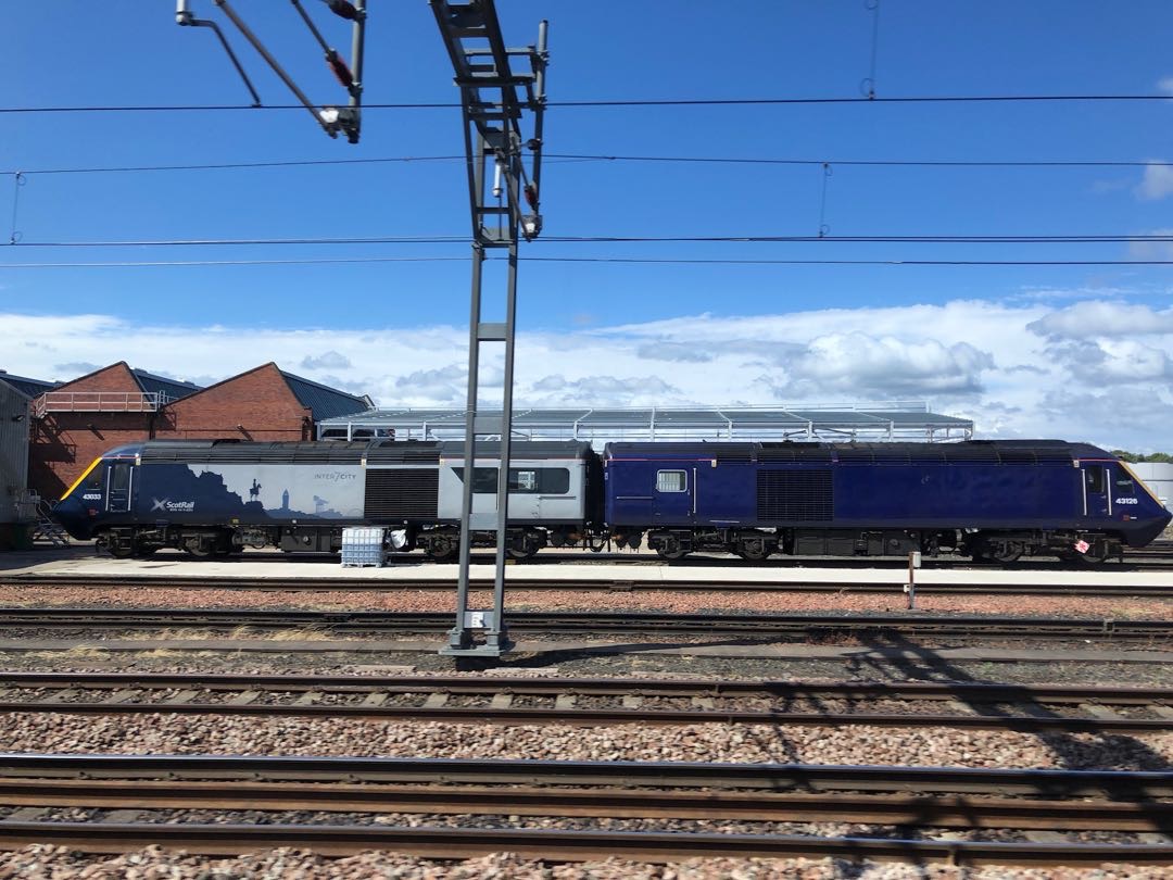 Allan on Train Siding: A pair of HST (Class 43) Power Car's stand back to back at Haymarket TMD (43033 in ScotRail 7 Cities livery & 43126 Sporting a
debranded First...