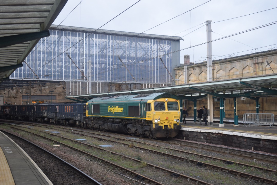 Hardley Distant on Train Siding: CURRENT: 66546 passes through Carlisle Station today with the 6E97 14:10 Carlisle New Yard to Tees Yard Gypsum service.