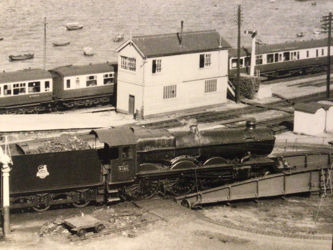 Alex Coomber on Train Siding: The end of the line alongside the River Dart at Kingswear. A Castle Class 4-6-0 No. 5028 LIantilio Castle takes on water before
hauling...