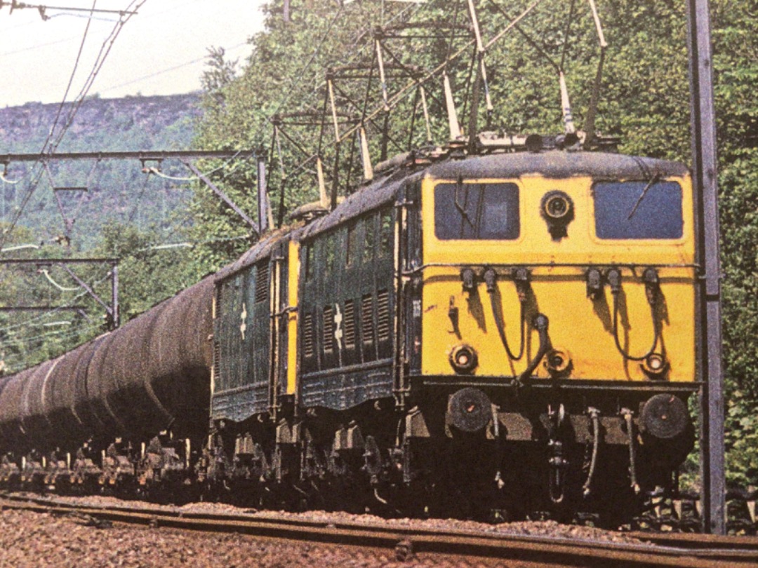 Alex Coomber on Train Siding: A Pair of Class 76s. 76016 and 76029 passes Wharncliffe Woods with Petrol Tanks from Stanlow Refinery to Ecclesfield on 1st June
1977.