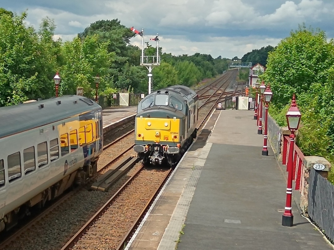 Whistlestopper on Train Siding: Rail Operations Group class 37/8 No. #37884 "Cepheus" passing Appleby this afternoon whilst a pair of Northern 158s
idle in platform 2...