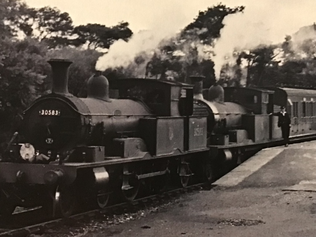 Alex Coomber on Train Siding: Superpower at Axminster for the 1 coach train to Lyme Regis. An ex LSWR Class 0415 4-4-2Ts Nos 30582 and 30583 stand in the bay
platform...