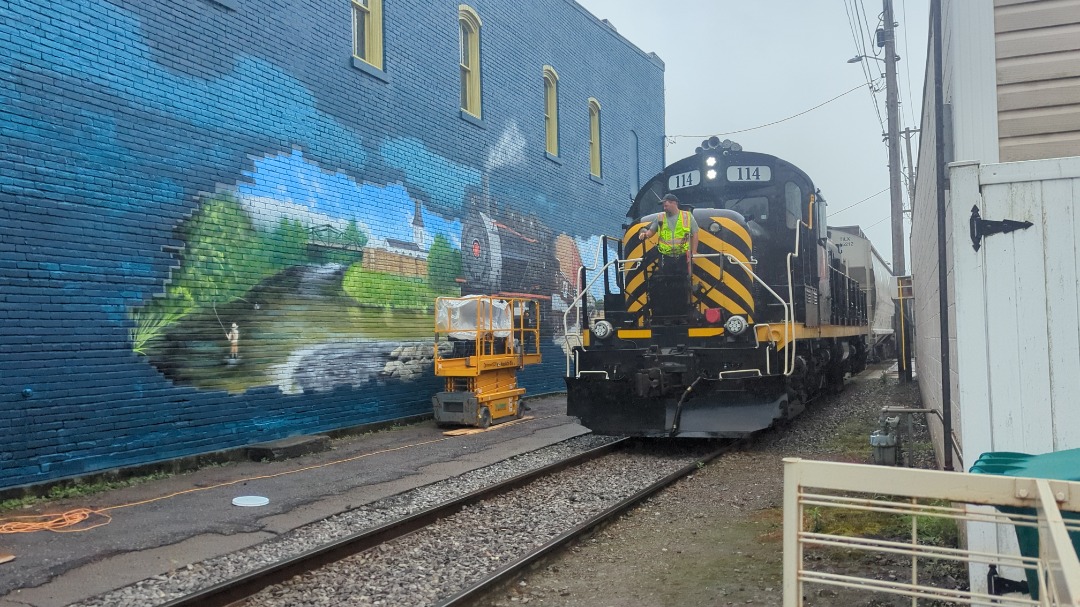 CaptnRetro on Train Siding: "Hometown Homage" - This mornings departure of Arcade & Attica No. 114 past a new/in progress mural across the street
from the depot....