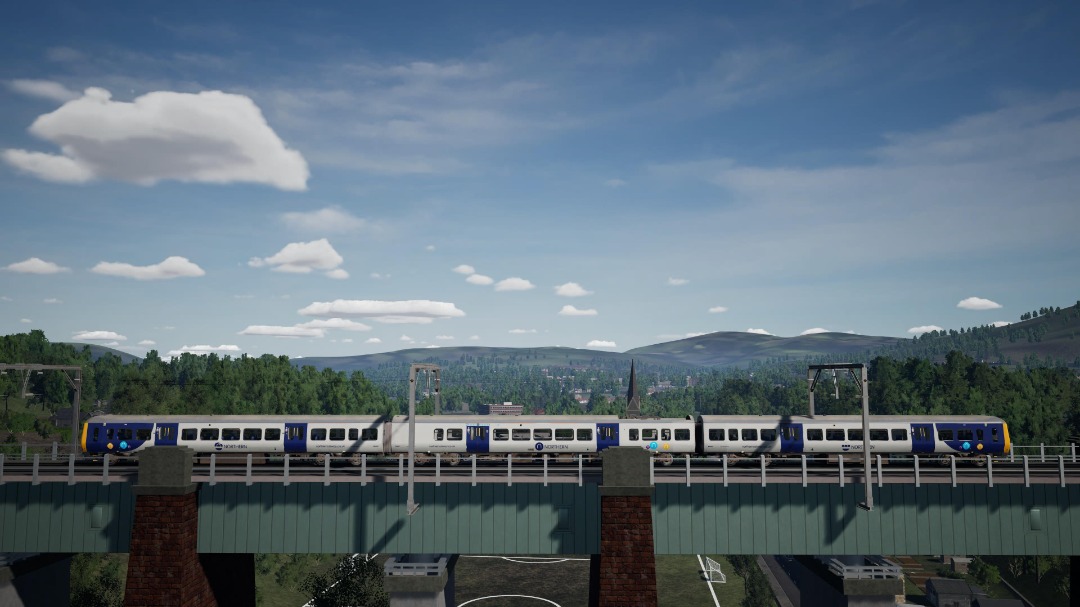 Neil Sellers on Train Siding: Class 323 in Northern livery no 323229 en route to Manchester Piccadilly. Crossing Dinting Arches with Glossop in the background
and the...