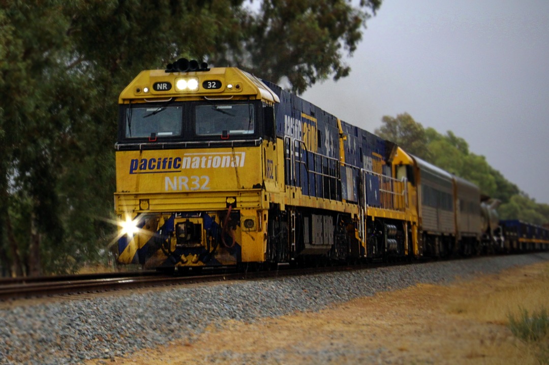 Gus Risbey on Train Siding: On a rainy Saturday morning, Pacific National's NR32 & NR48 are leading 7PX4 empty steel train service. This train will go
on to cross the...