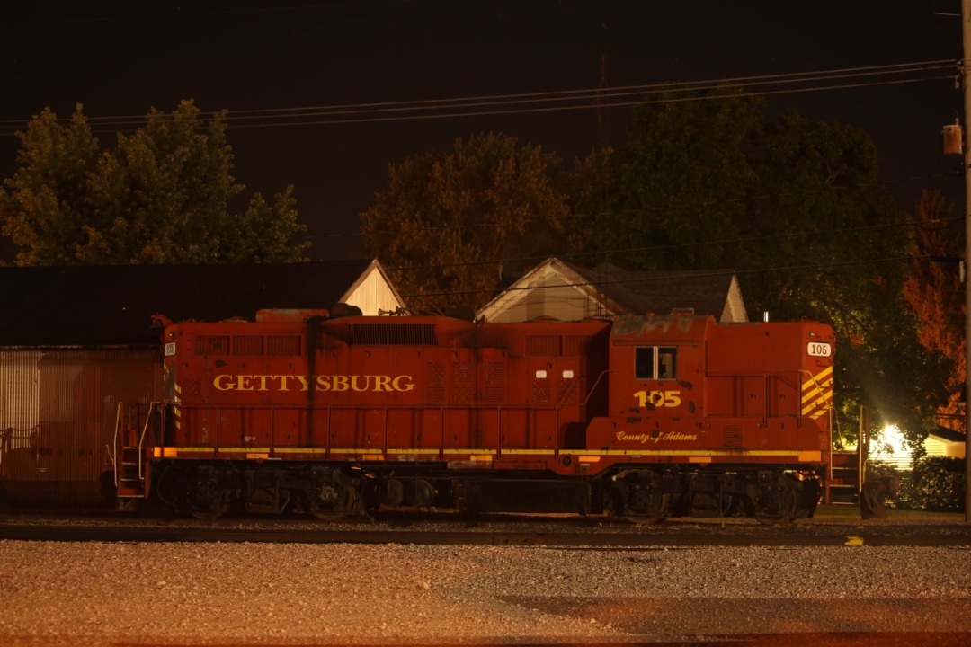 Mason Halsey on Train Siding: Napolean Defiance and Wetsern Locomotives sit quietly in Defiance, Ohio on a warm July, 2024 Night.