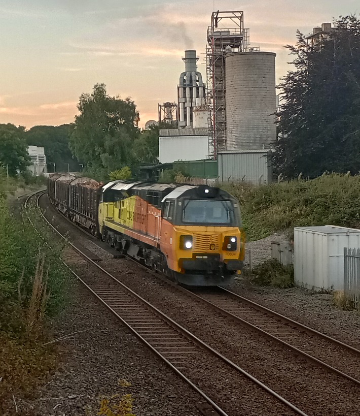 Hardley Distant on Train Siding: CURRENT: With its destination in the background, 70804 approaches Chirk Station today with the 6J37 12:52 Carlisle Yard to
Chirl...