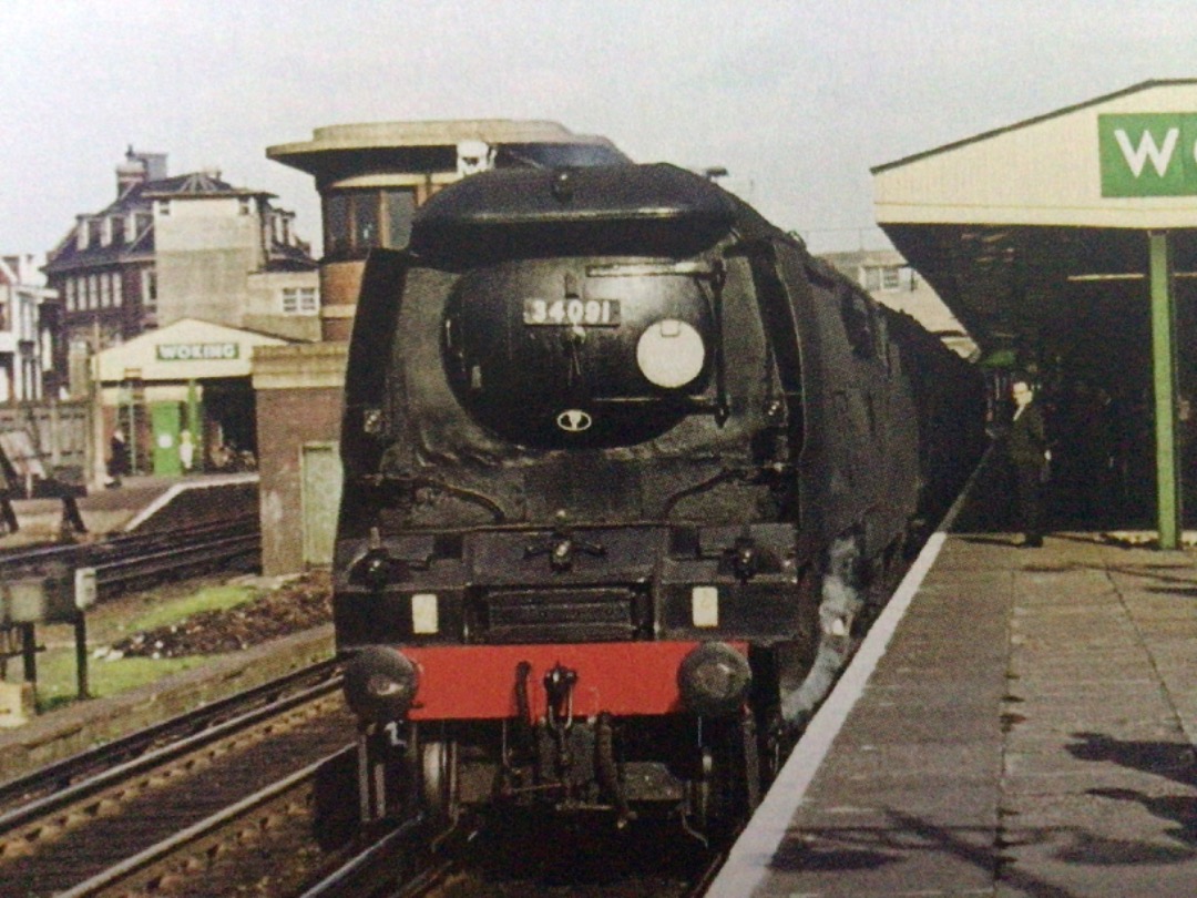 Alex Coomber on Train Siding: Watched by a local cool dude. An unrebuilt West Country Class 4-6-2 No. 34091 Weymouth restarts a down train from Woking on
28th...