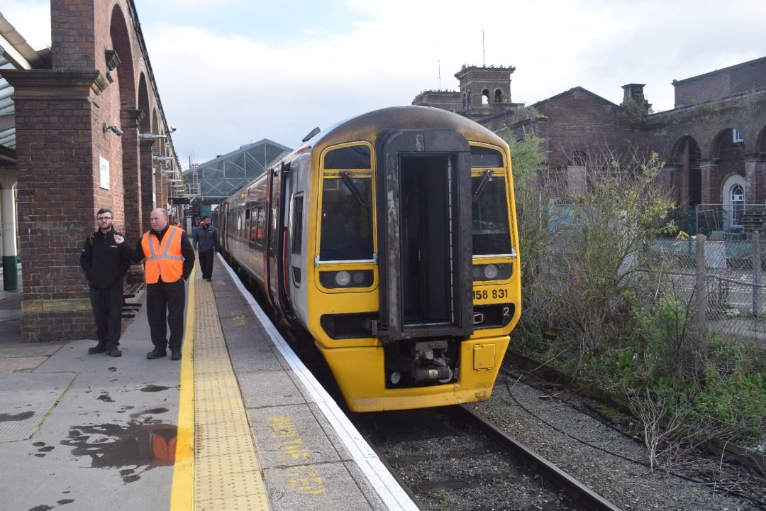 Hardley Distant on Train Siding: CURRENT: An unuusual sight as 158831 stands with its central end door open at Chester Station today as it awaits the late
arrival of...