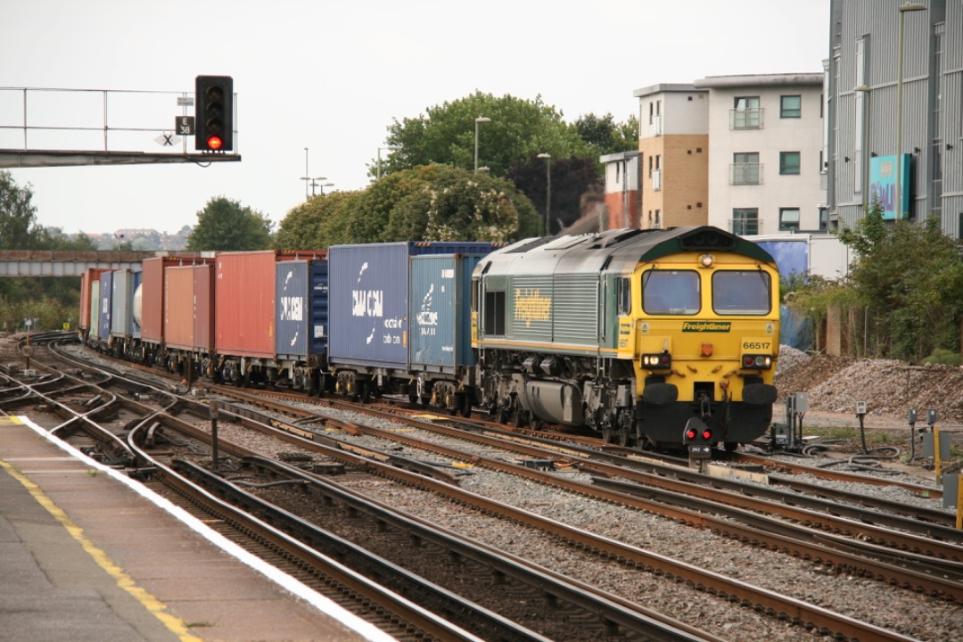 Martin Coles on Train Siding: 10 years ago today, 15th August 2014 at Eastleigh 60091 with mixed wagons, 66517 heading north from Southampton, 450550 powering
through...