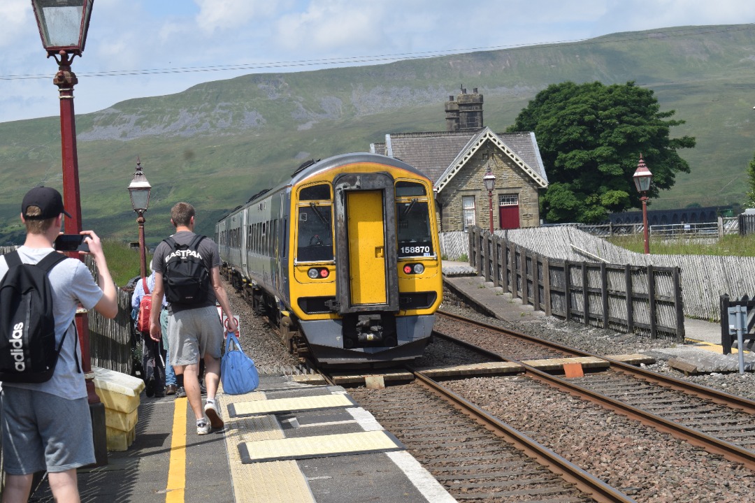 Hardley Distant on Train Siding: CURRENT: 158870 (Rear - Nearest Camera) and 158851 (Front - Away From Camera) depart from Ribblehead Station today with the
2H86 10:49...