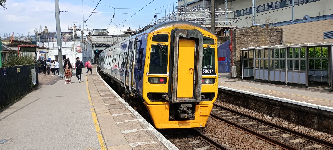 Hardley Distant on Train Siding: CURRENT: 158817 stands at Keighley Station today with the 2H06 10:18 Leeds to Morecambe (Northern) service.