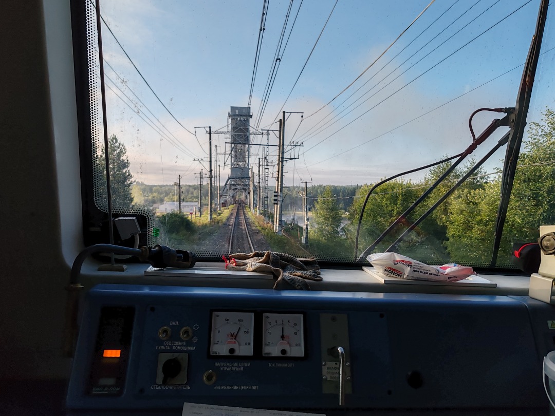 CHS200-011 on Train Siding: Fork from the cab of an EP2K electric vehicle onto a railway drawbridge across the Svir River