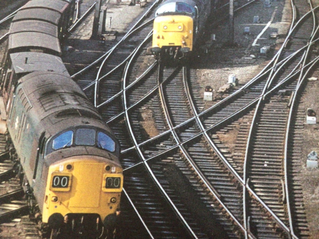 Alex Coomber on Train Siding: At Newcastle. On the left is a Class 37. 37058 passes with a short freight and on the right is a Class 55 Deltic. 55016 Gordon
Highlander...