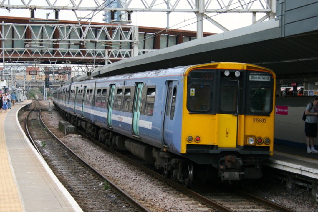 Martin Coles on Train Siding: On this day, 10th August 2012. Greater Anglia 90014 heads towards Norwich, while 315803 brings up the rear of the Shenfield
service. Both...