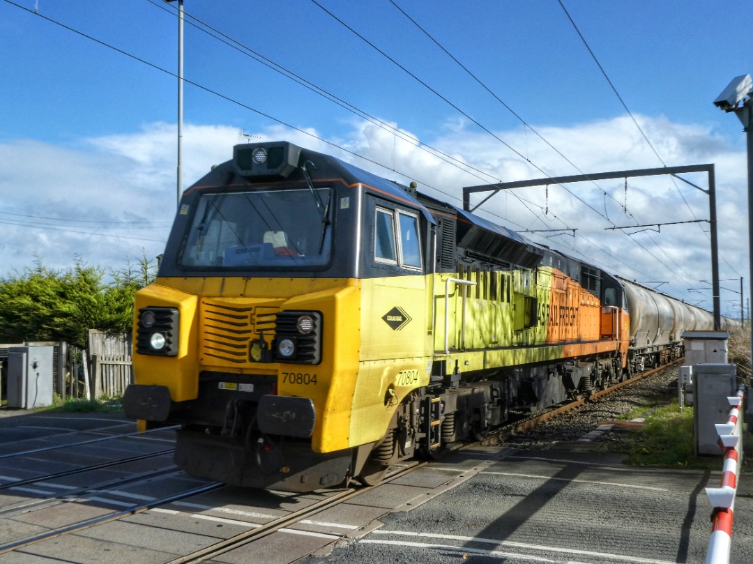 The Jamster on Train Siding: Colas Rail 70804 heads north at Stannington level crossing on the east coast mainline near Morpeth with 6S29 1230 Hunslet Yard
to...
