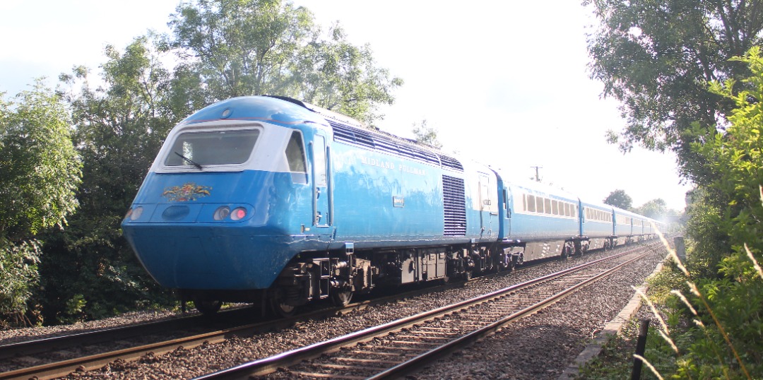 Jamie Armstrong on Train Siding: Midland Pulman 43046 & 43049 5Z61 1437 Colchester Goods Loop to Crewe H.S. Seen passing Swarkestone Lock Foot crossing,
Derby (21/07/24)