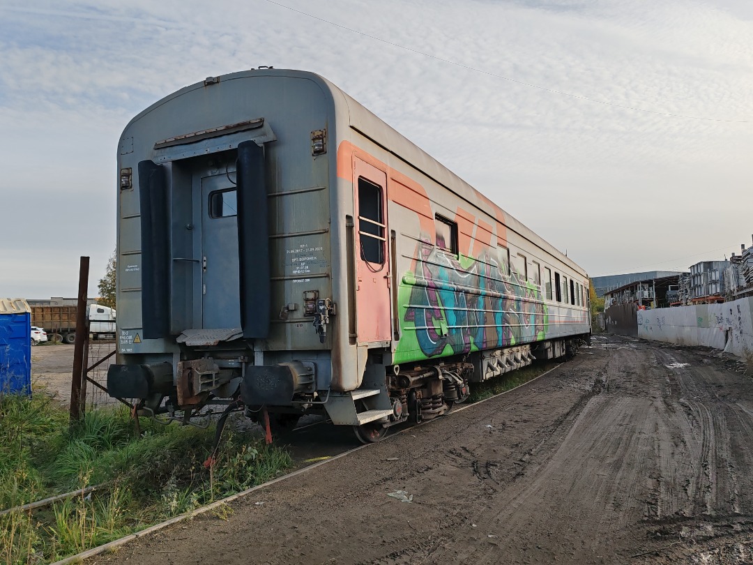 CHS200-011 on Train Siding: Buffet car model 47 Bk/Ki produced by WEB (Görlitz) in the process of disposal. These cars were used on long-distance trains as
an...