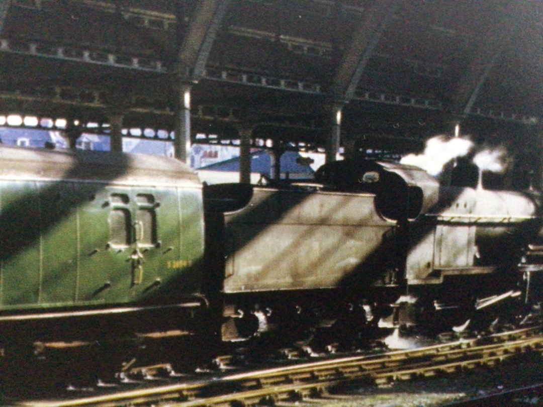 Alex Coomber on Train Siding: A Somerset & Dorset Class 7F locomotive No. 53806 simmers amid the morning sun beams at Bath Green Park Station after hauling
the 07:00am...