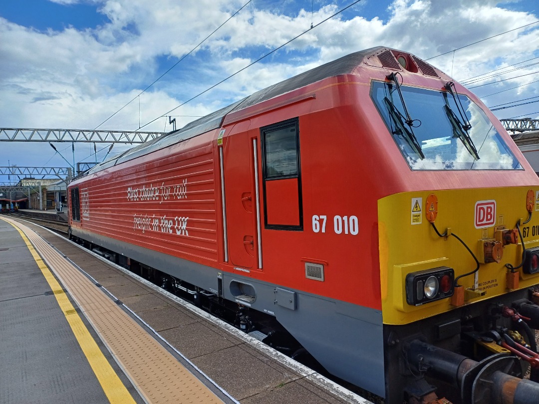 James Taylor on Train Siding: 2 class 67 at crewe Station 67010 and 67017 one in DB red and one in grey and red in transport for Wales livery