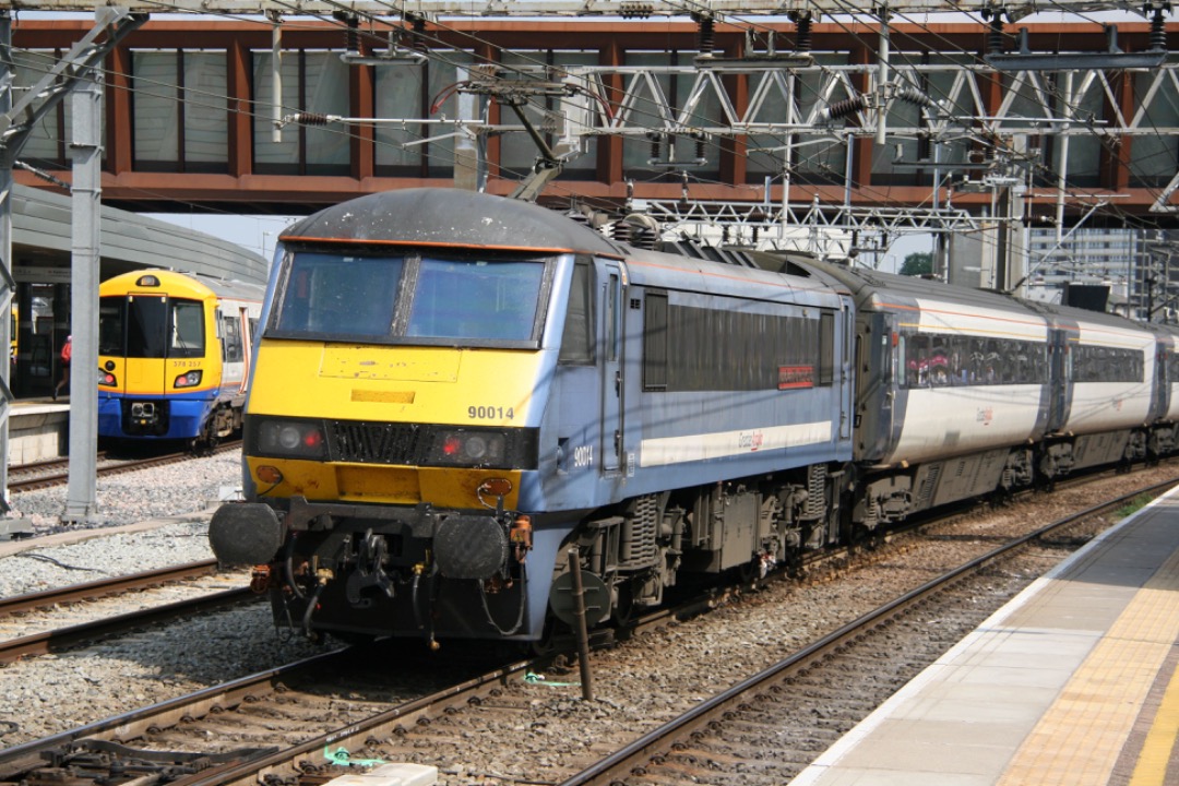 Martin Coles on Train Siding: On this day, 10th August 2012. Greater Anglia 90014 heads towards Norwich, while 315803 brings up the rear of the Shenfield
service. Both...