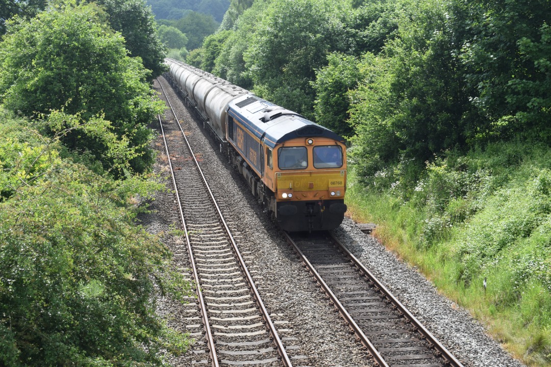 Hardley Distant on Train Siding: CURRENT: 66768 passes through Rhosymedre near Ruabon today with the 6M42 09:20 Avonmouth Hanson Siding to Penyffordd Cement
empty...