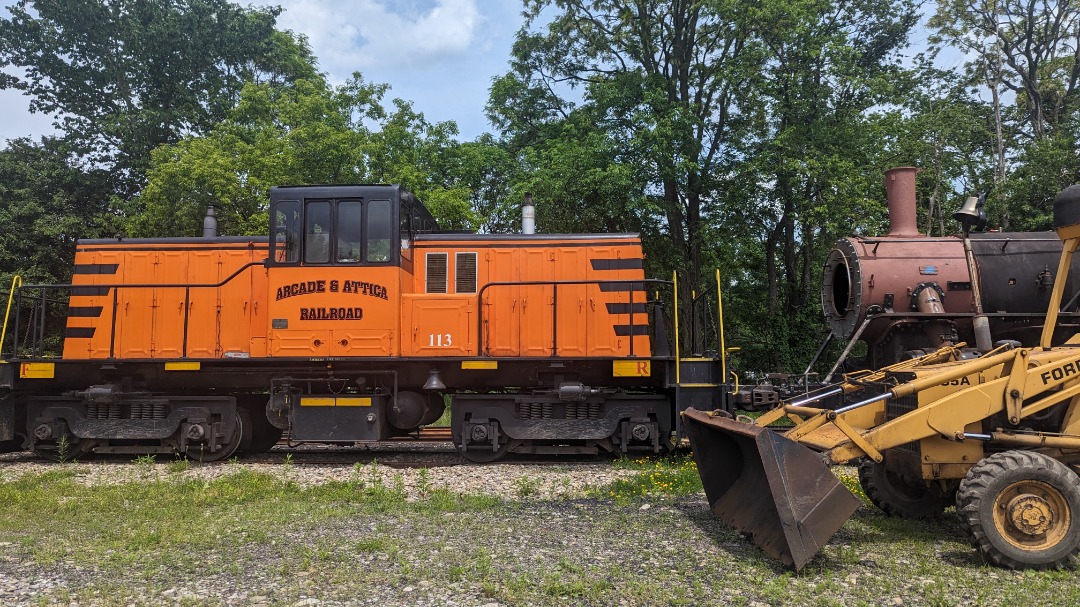 CaptnRetro on Train Siding: Arcade & Attica #113, a GE 80 ton (reweighted from a 65 ton) Centercab. Shown here coupled A&A #18 (formerly Boyne City #18)
which is...