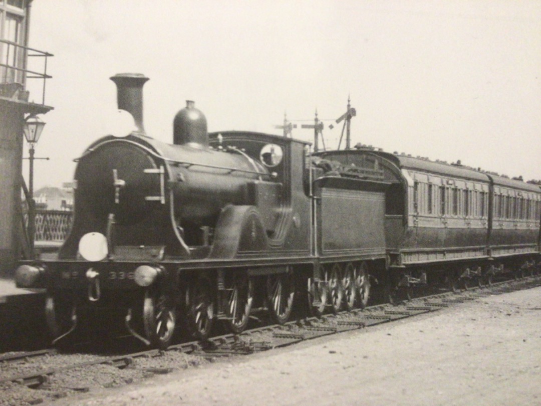 Alex Coomber on Train Siding: Hauled by Class T9 4-4-0 No. 338. A London South Western Railway express from London Waterloo roars through Earlsfield Station
circa 1903.