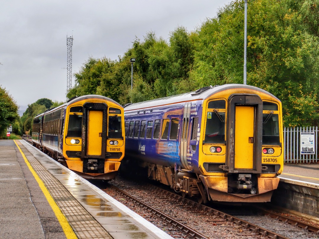 The Jamster on Train Siding: Scotrail 158710 arrives at Muir of Ord working 2H85 1335 Inverness to Kyle of Lochalsh while 158705 waits with the empty coaches of
2H63...